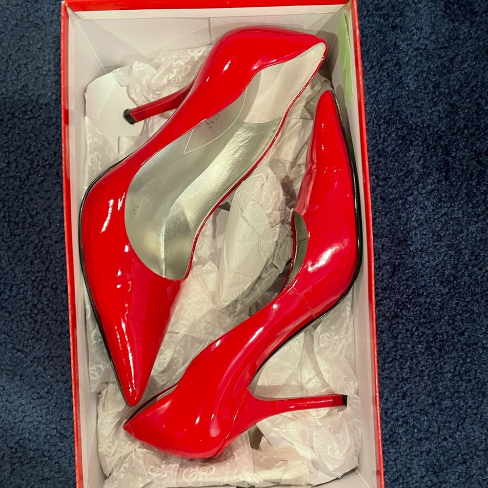 Size 6 Guess red pumps, like new, worn twice